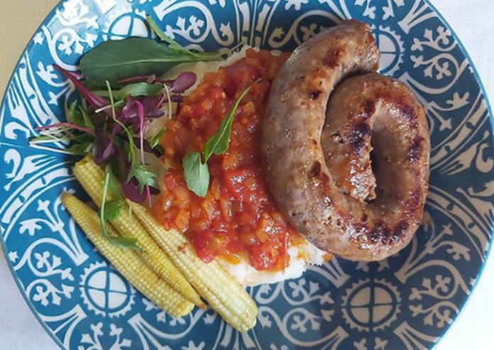 Delicious Pap and Boerewors Served with Tangy Tomato Relish